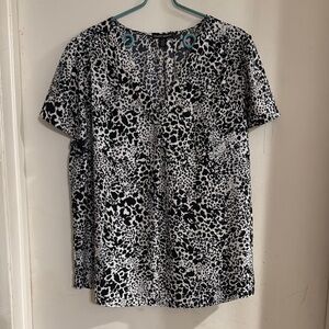 Black and White Leopard print Flowy Blouse featuring a V-Neck neckline